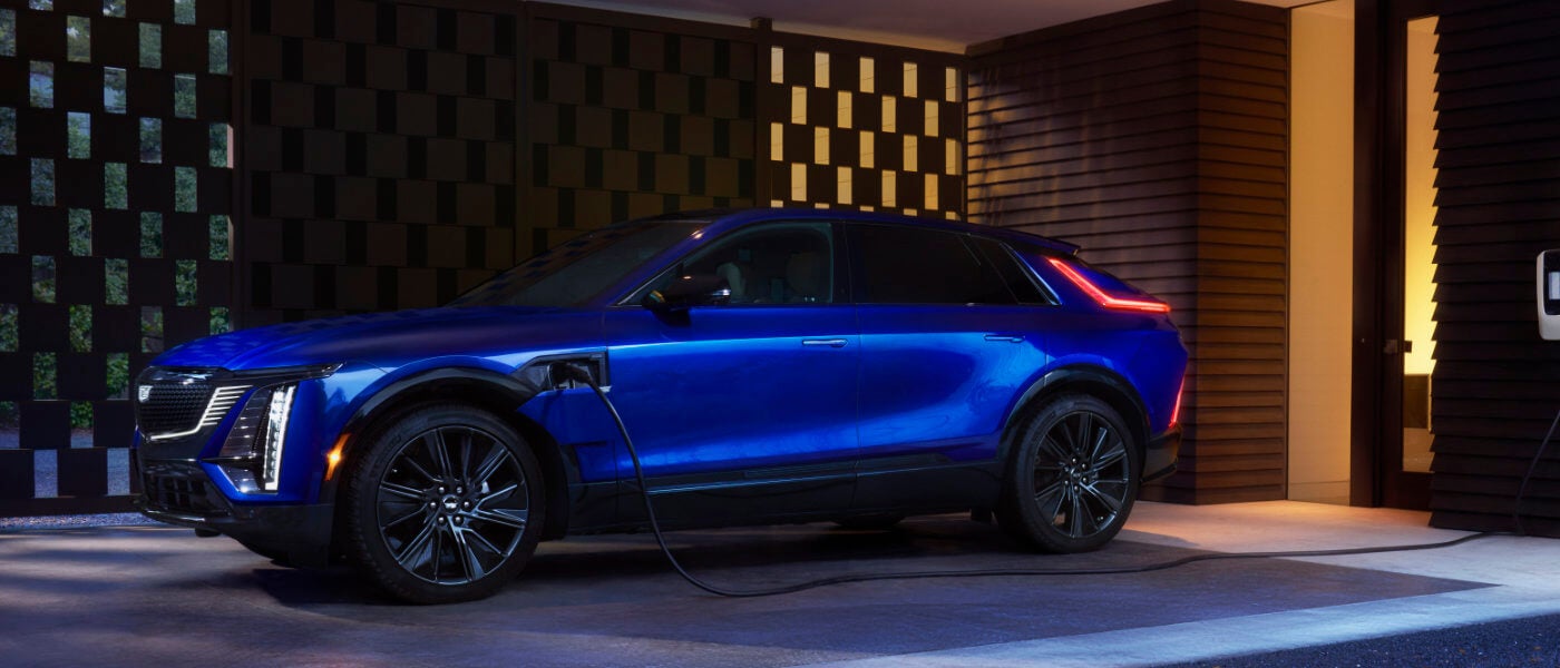 2025 Cadillac LYRIQ Exterior Charging In Covered Driveway